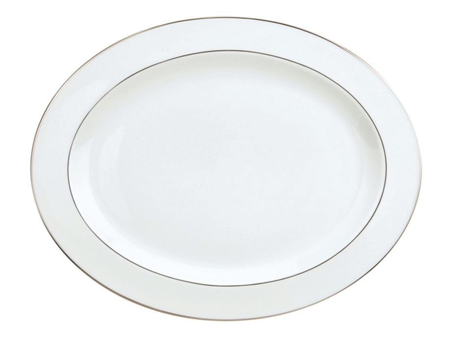 Gilded oval platter in porcelain - Christofle